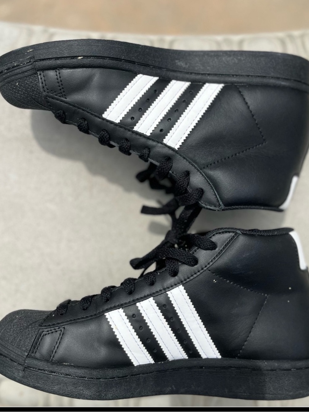 Adidas pro-model high top sneakers.